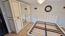 Mobilier dormitor din lemn cu pat tapițat și dulap 2100×600×2100 mm – Bacău