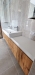 Mobilier de baie din MDF furniruit, cu fronturi Rauvisio Crystal și sertare Blum soft-close