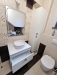 Mobilier baie din MDF vopsit cu riflaj și feronerie Blum