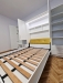 Mobilă cu pat rabatabil în Brașov, cu dulapuri laterale și depozitare integrată