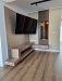 Mobilier living la comandă – comodă TV suspendată cu corpuri îmbinate la 45°, Bacău