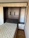 Set dormitor cu pat rabatabil la Brasov