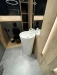 Mobilier de baie din MDF vopsit lucios, cu iluminare LED Hafele și feronerie Blum