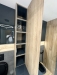 Mobilier de baie din MDF vopsit lucios, cu iluminare LED Hafele și feronerie Blum