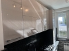 Mobilier bucătărie la comandă – MDF lucios Perfect Sense, blat granit, Bacău