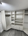 Cameră Dressing Multifuncțională cu Masă de Călcat Incorporată