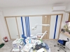 Mobilier cabinet stomatologic din PAL, montat în Buhuși, județul Bacău